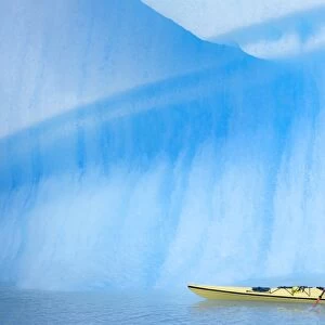 Person kayaking near icebergs, Lago Gray (Lake Gray) (Lake Grey), Torres del Paine National Park