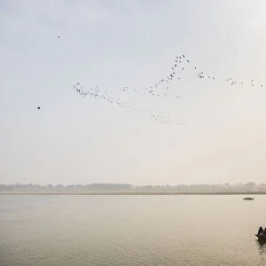 Pilgrims on a boat on the River Ganges, Varanasi, Uttar Pradesh, India, Asia