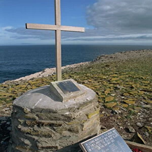 Poppy wreaths laid on the 1982 War Memorial to the dead of HMS Sheffield on Sealion Island in the Falkland Islands