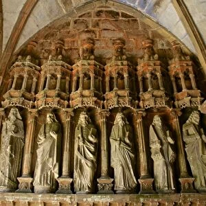 Porch entrance detail with statues of the Apostles, church dating from the 16th and 17th centuries, Guimiliau parish enclosure, Finistere, Brittany, France, Europe