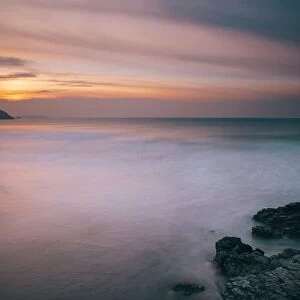Porthtowan beach looking along the Cornish coastline at sunset, Porthtowan, Cornwall, England, United Kingdom, Europe