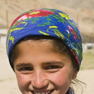 Portrait of a young smiling woman, Shokh Dara Valley, Tajikistan, Central Asia, Asia