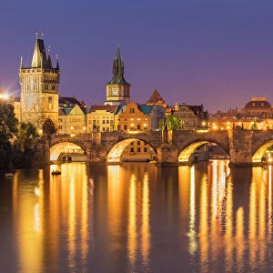 Prague Charles bridge, Old town bridge tower and river Vltava at night, UNESCO World