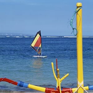 Prahu boat and windsurfer