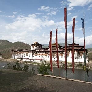 Prayer flags by Punakha dzong (monastery), at the confluence of the Pho chu (Father) and Mo Chu