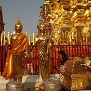 Procession and Buddha statues in Doi Suthep temple, Chiang Mai, Thailand, Southeast Asia, Asia