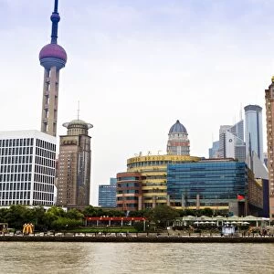 Pudong skyline across the Huangpu River, Oriental Pearl tower on left, Shanghai, China, Asia