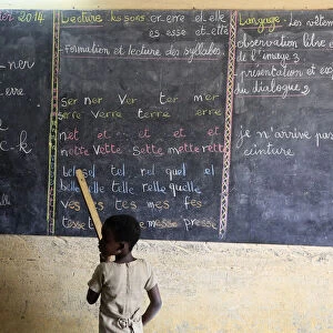 Pupil at the blackboard, primary school, Lome, Togo, West Africa, Africa