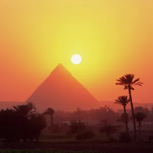 Pyramid silhouetted at sunset, Giza, UNESCO World Heritage Site, Cairo