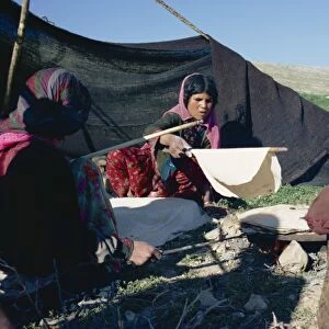 Qashqai women making bread in camp