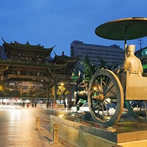 Qintai street statue and Chinese gate, Chengdu, Sichuan Province, China, Asia