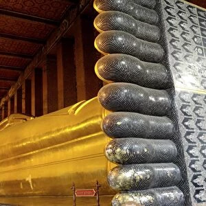 Reciling Buddha statue, Wat Phra Chetuphon (Wat Po), a temple that predates the citys foundation, Bangkok, Thailand, Southeast