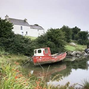 Red boat and house