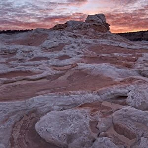 Red clouds over sandstone at sunrise, White Pocket, Vermilion Cliffs National Monument, Arizona, United States of America, North America