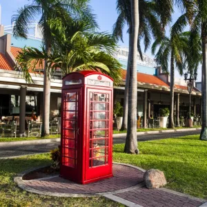 Red telephone box in downtown Oranjestad, capital of Aruba, ABC Islands, Netherlands Antilles, Caribbean, Central America