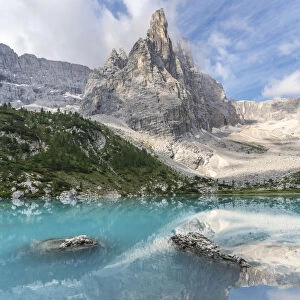 Reflection of Sorapis Group on Sorapis Lake in summer. Cortina d Ampezzo, Belluno province