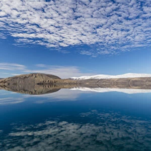 Reflections in the calm waters of Makinson Inlet, Ellesmere Island, Nunavut, Canada