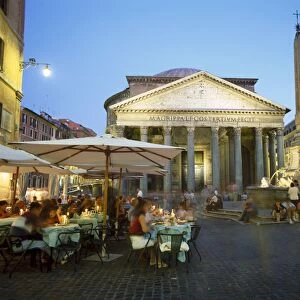 Restaurants under the ancient Pantheon in the evening