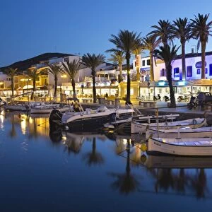 Restaurants at night along the harbour, Fornells, Menorca, Balearic Islands, Spain