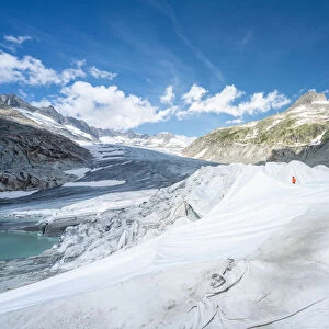 Rhone Glacier covered with white blankets to prevent extreme melting due to climate
