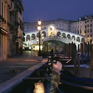 The Rialto Bridge illuminated at night in Venice, UNESCO World Heritage Site