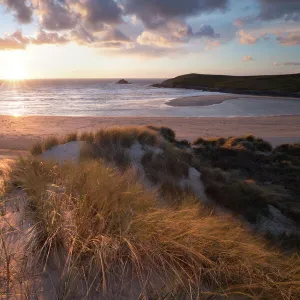 Ribbed sand and sand dunes at sunset, Crantock Beach, Crantock, near Newquay, Cornwall