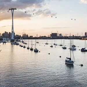 River Thames at sunset and the Emirates Air Line Cable Car, East London, England