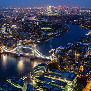 River Thames, Tower Bridge and Canary Wharf from above at dusk, London, England