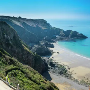 Road connecting the narrow isthmus of Greater and Little Sark, Channel Islands, United Kingdom