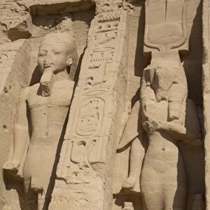 Rock-hewn statues of Ramses II on left, and Queen Neferatri on right, Hathor Temple