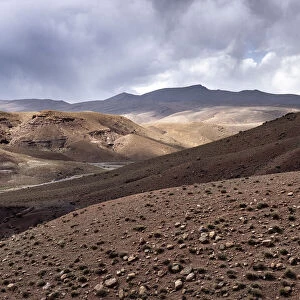 Rocky panorama of the high Atlas mountains in Morocco with a cloudy sky, Morocco
