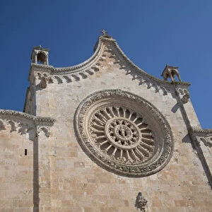 The rose window on the Cathedral of Santa Maria dell Assunzione in Ostuni, Puglia, Italy