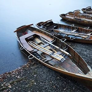Rowing boats on the Lakeshore, Derwentwater, Keswick, Lake District National Park, Cumbria, England, United Kingdom, Europe