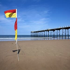 Safe Bathing flag on the beach at Saltburn by the Sea, Redcar and Cleveland, North Yorkshire, Yorkshire, England, United Kingdom, Europe
