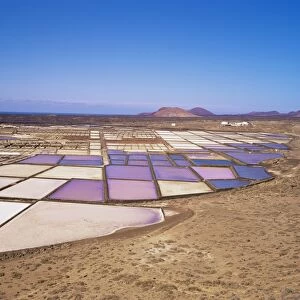 Salt pans and volcanoes in the background, near Yaiza, Lanzarote, Canary Islands