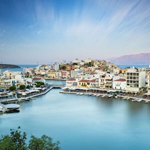 Seaside town resort of Agios Nikolaos by lake Voulismeni, Lasithi prefecture, Crete