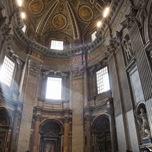 Shaft of light through window of the interior of St. Peters Basilica