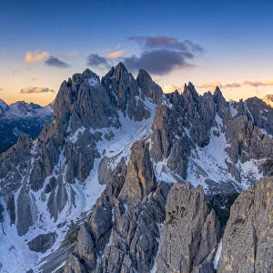 Sharp pinnacles of Cadini di Misurina mountains at sunrise, Dolomites, Belluno province