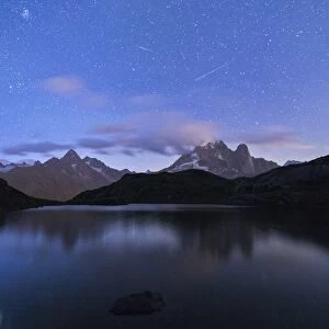 Shooting stars on the rocky peaks of Les Drus and Aiguille Verte, Lacs De Cheserys