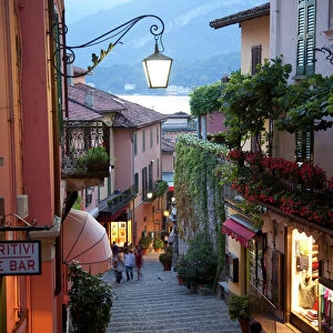 Shopping street at dusk, Bellagio, Lake Como, Lombardy, Italy, Europe