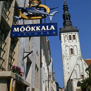 Sign for the Mookkala Restaurant with the Niguliste Church behind, Old Town