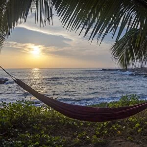 Silhoutte of an empty beach hammock at the beach, Tangalle, Sri Lanka, Asia