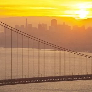 Sillouette of the Golden Gate Bridge and San Francisco skyline at sunrise, San Francisco, California, United States of America, North America