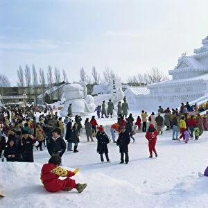 Snow sculpture and crowds during Snow Festival