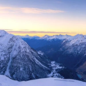 Snowy peaks of Valle Spluga at sunset, aerial view, Valchiavenna, Valtellina, Lombardy