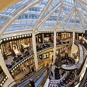 Spiral staircase and decorative floor tiles in luxury shopping centre, Quartier 206 on Friedrichstrasse, Berlin