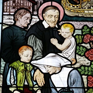 Stained glass depicting St. Vincent de Paul, founder of the Daughters of Charity
