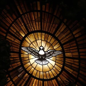 Stained glass window in St. Peters basilica of Holy Spirit dove symbol, Vatican