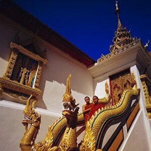 Staircase with Nagas (sacred snake) and two Buddhist monks