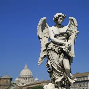 Statue of an angel in front of the dome of St. Peters in Rome, Lazio, Italy, Europe